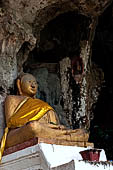 Luang Prabang, Laos - The Pak Ou Caves, the upper cave called Tam Theung. The caves, a Buddhist pilgrimage site, are a repository of old Buddha statues.